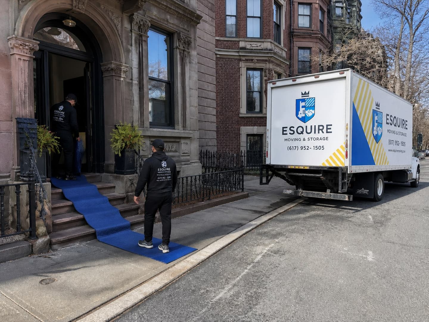 Esquire movers protecting the entry path at a Boston brownstone
